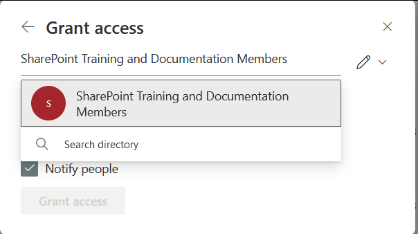 A search dialog box with a user group highlighted from a search result.