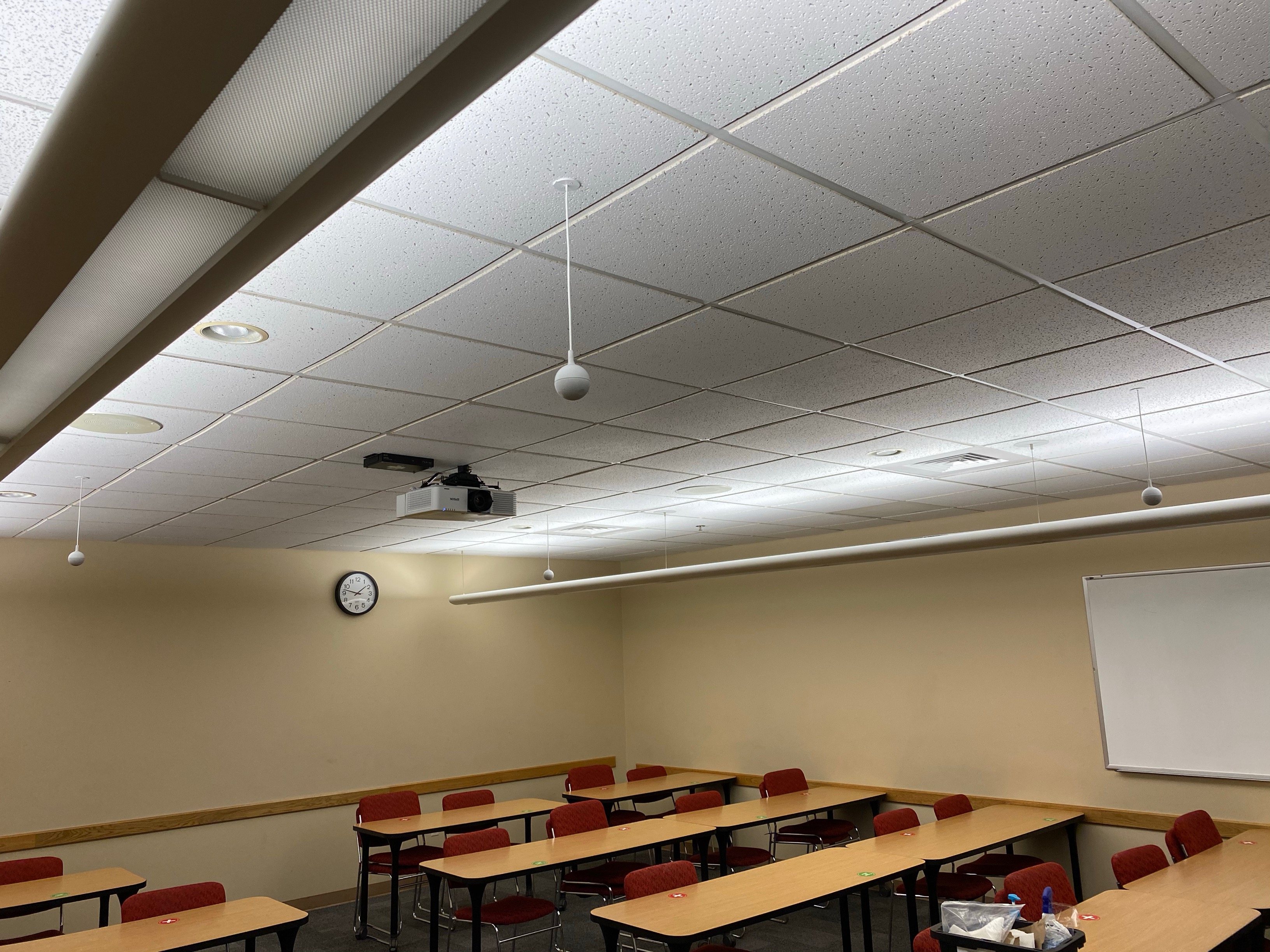 Hyflex microphones hanging in a classroom